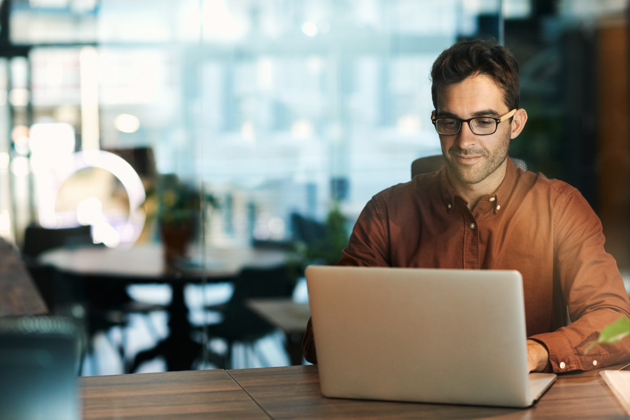 Man learning to improve career marketability